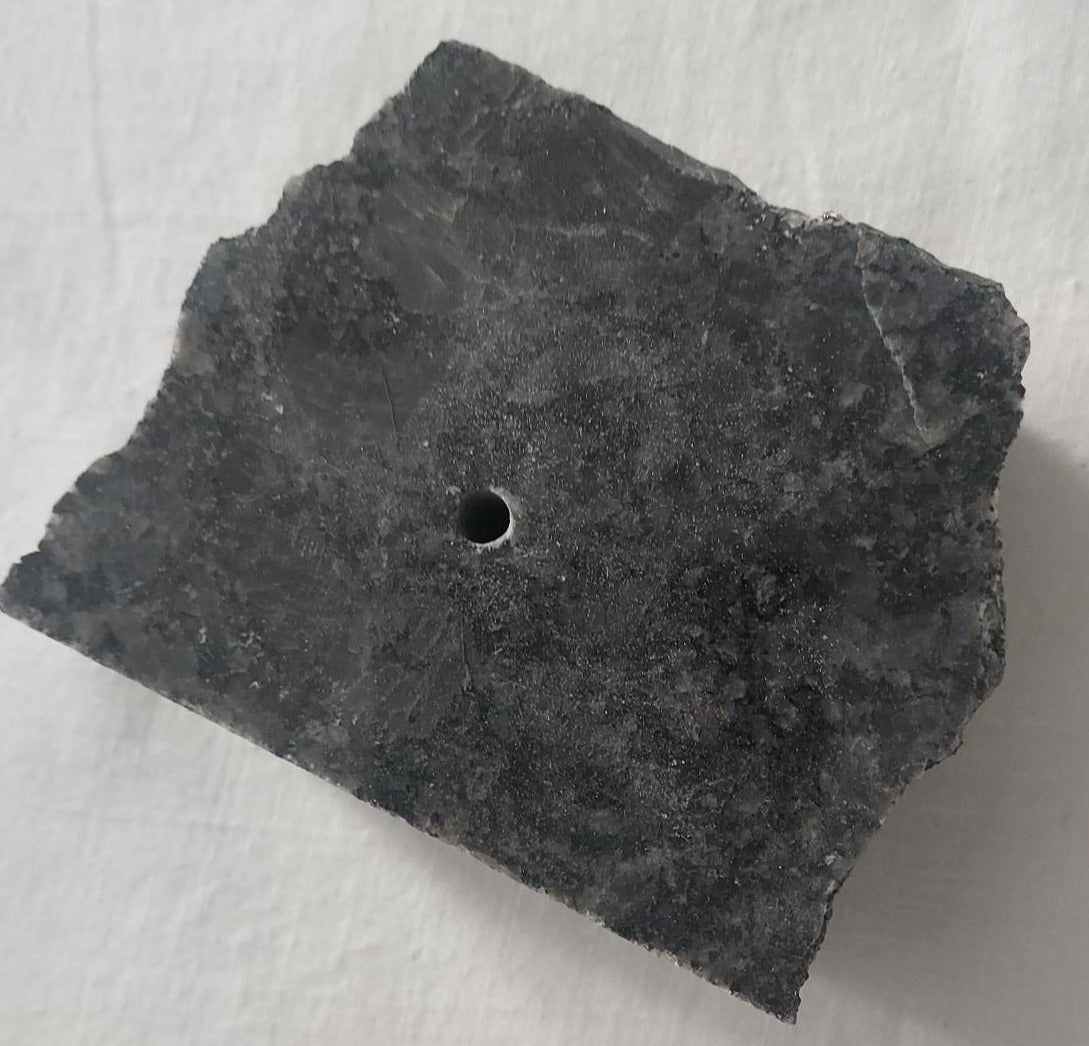 Dark granite base for single wire tree